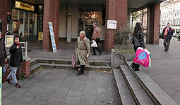 Pedestrians with shopping bags
