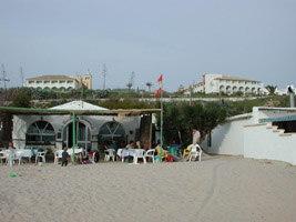 Jimunez at Playa de la Fontanilla, with Hotel El Fuerte in the background