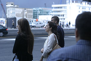 People waiting for the bus at Via A. Gramsci, and eyeing the approaching thunderstorm