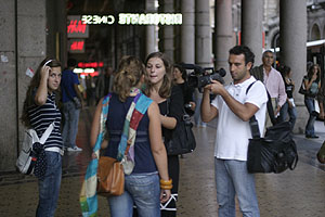 Television interview under the arcades of Piazza de Ferrari