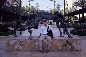The author / photographer seated underneath a Dali scupture, marbella