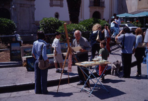 Plein-air painter in Monreale