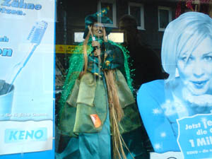 Self-portrait with cardboard woman, witch and tooth brush