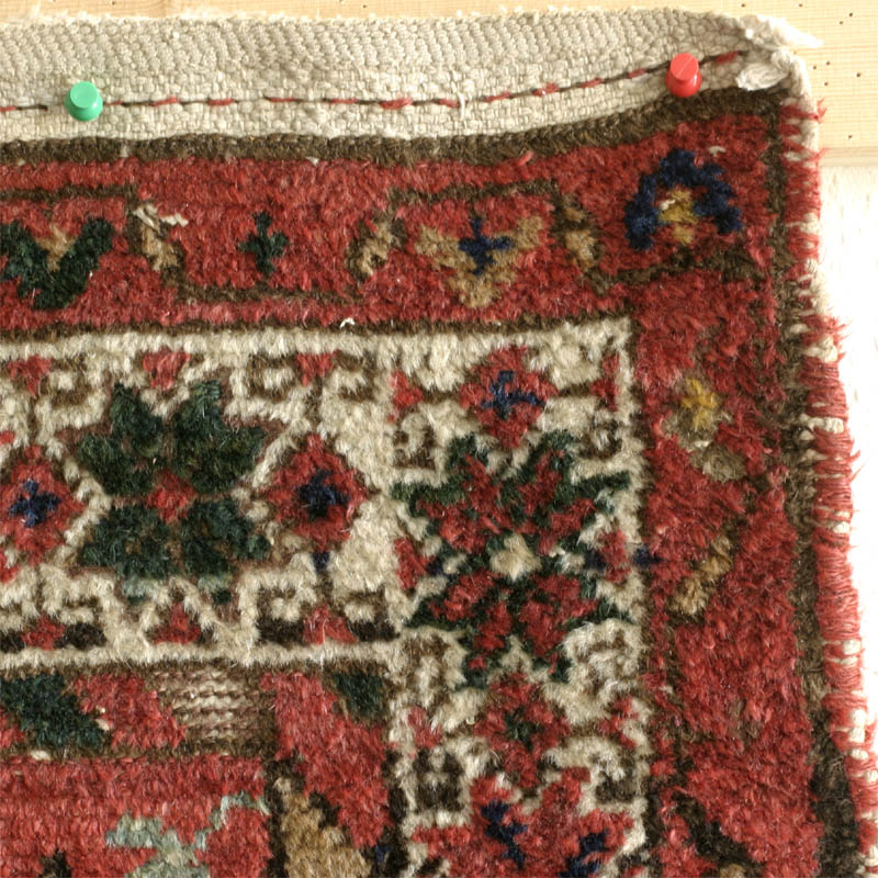 Kurdish or Afshar rug, large blossom medallions- upper end finish