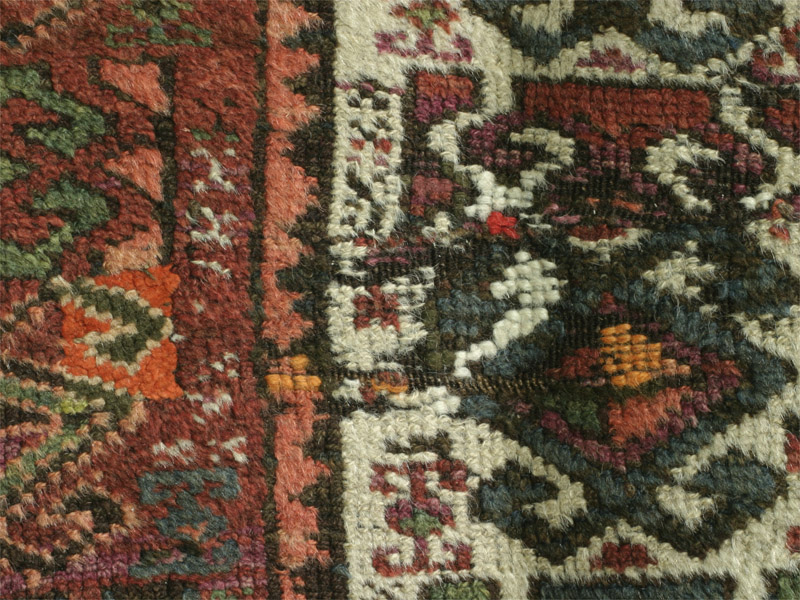 East Anatolian all-border rug, two areas repiled