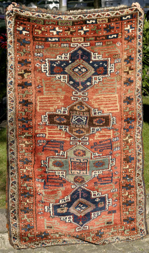 Full pile Anatolian village rug, 19th c.—click to see enlarged view