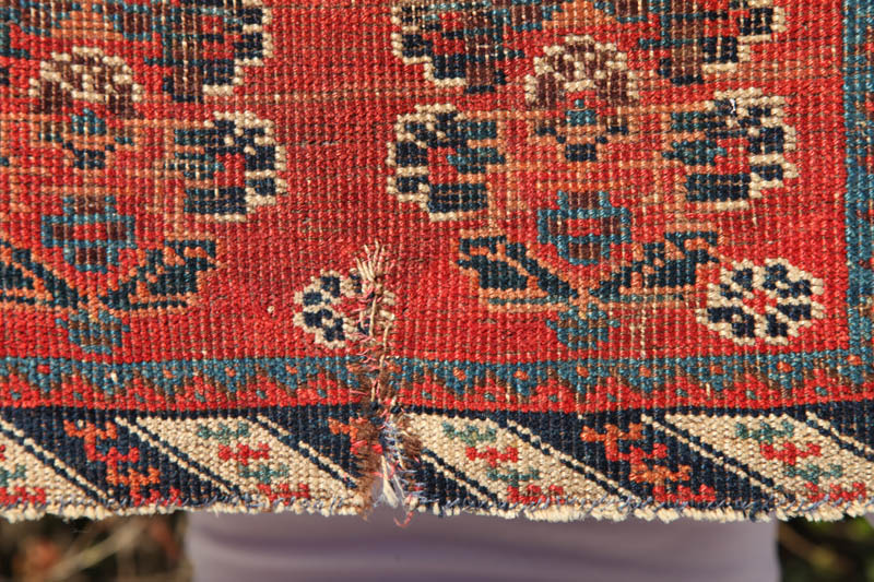 Afshar bag face - tear at bottom end