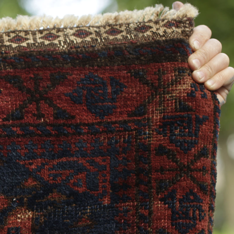 Baluch bag face - weft float broading