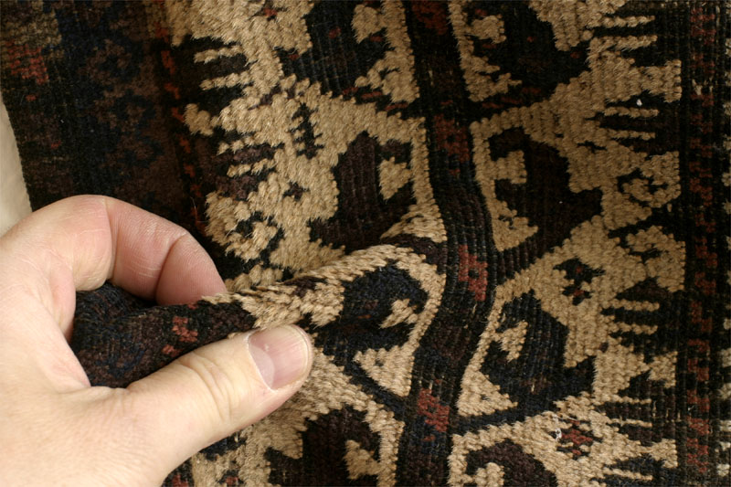 Baluch prayer rug with tree of life design, pile fold