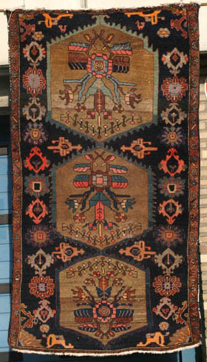 Bold unusual Kurdish Hamadan with vases on camel-coloured hexagon medallions—click to see enlarged view