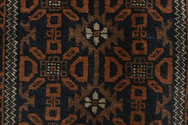 Small antique Khorassan Baluch rug with endless repeat diamond and flower design, pattern detail