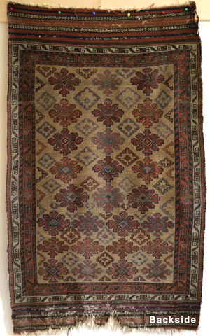 full view of old Baluch rug