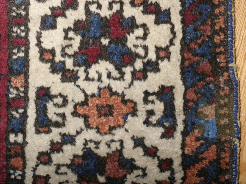anothr repair with synthetically dyed wool, this time in the border