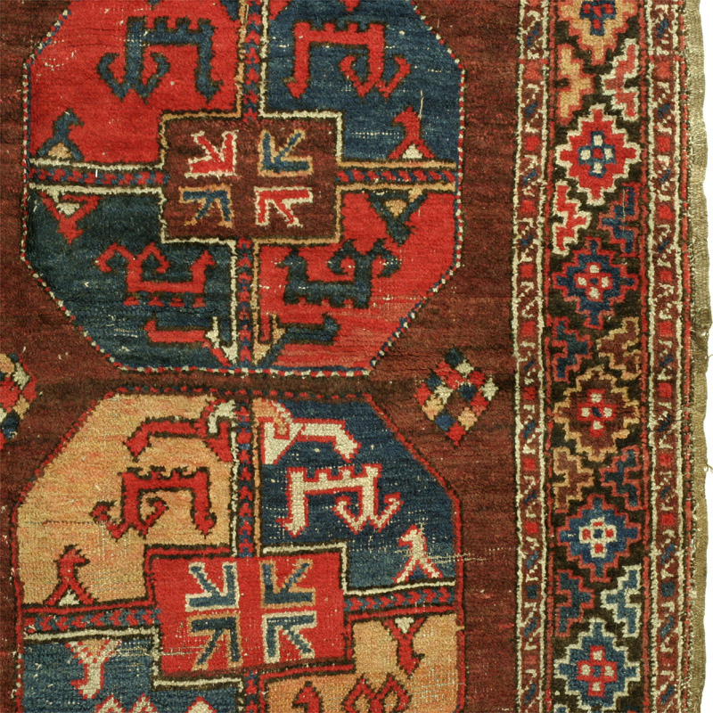 Karakalpak or Uzbek main rug - two Kalkan nuska (shield medallion) guls