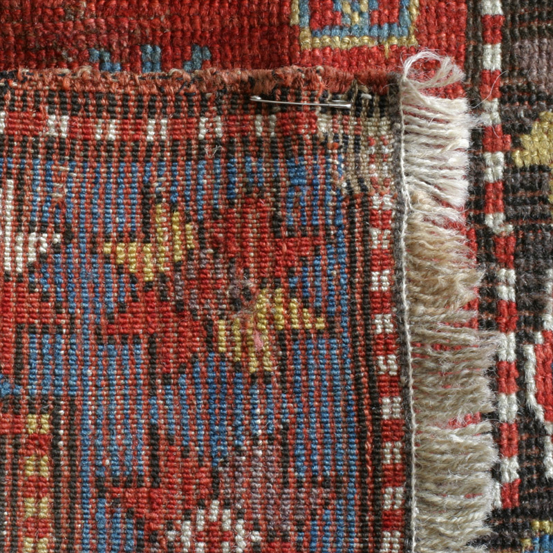 Kurd Kazak - back with repaired areas