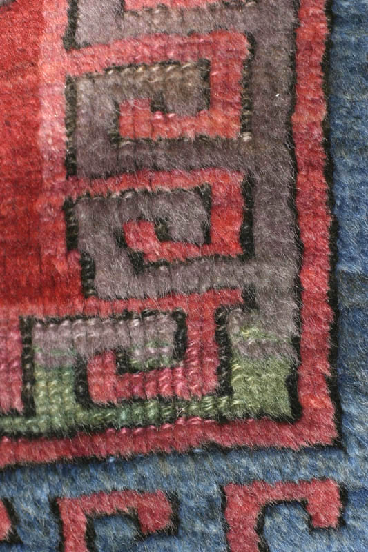 Anatolian kurd prayer rug, detail view of front showing green colour change