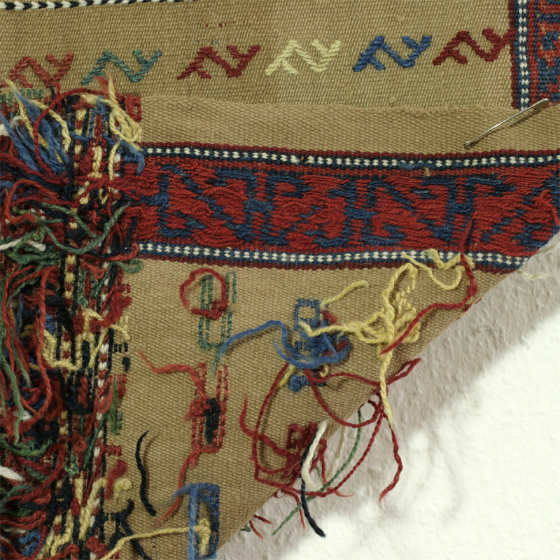 Kurdish sofreh - view of the back with loose ends of extra weft wrapping