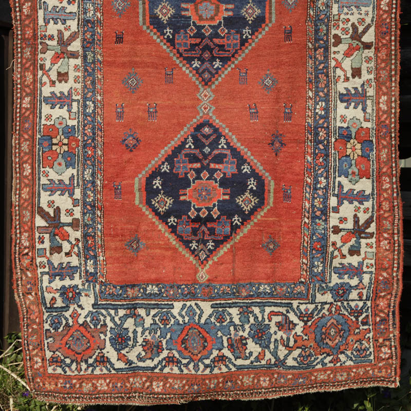 Kurdish medallion rug with humans and animals - bottom half