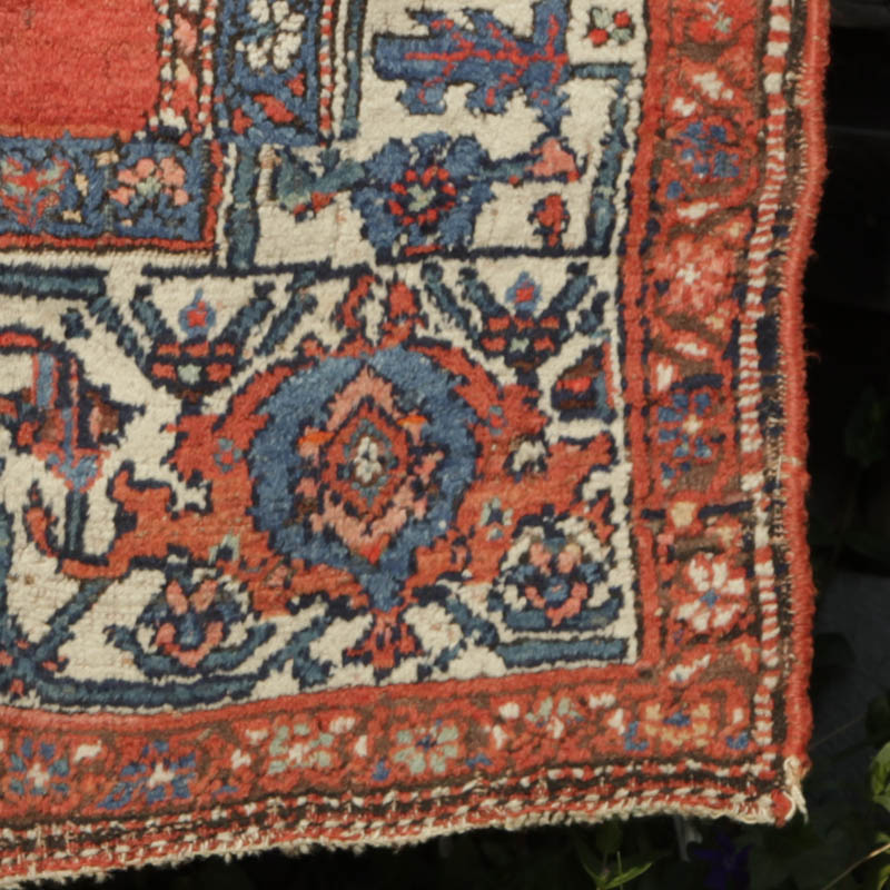 Kurdish medallion rug with humans and animals - bottom right corner