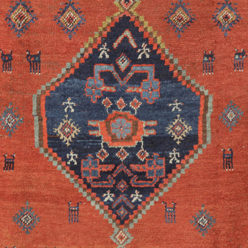 Kurdish medallion rug with humans and animals - central medallion