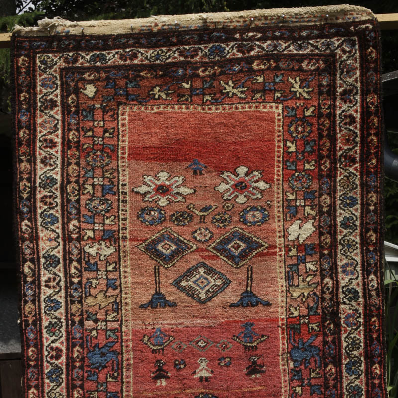Kurdish rug with humans and animals - top half