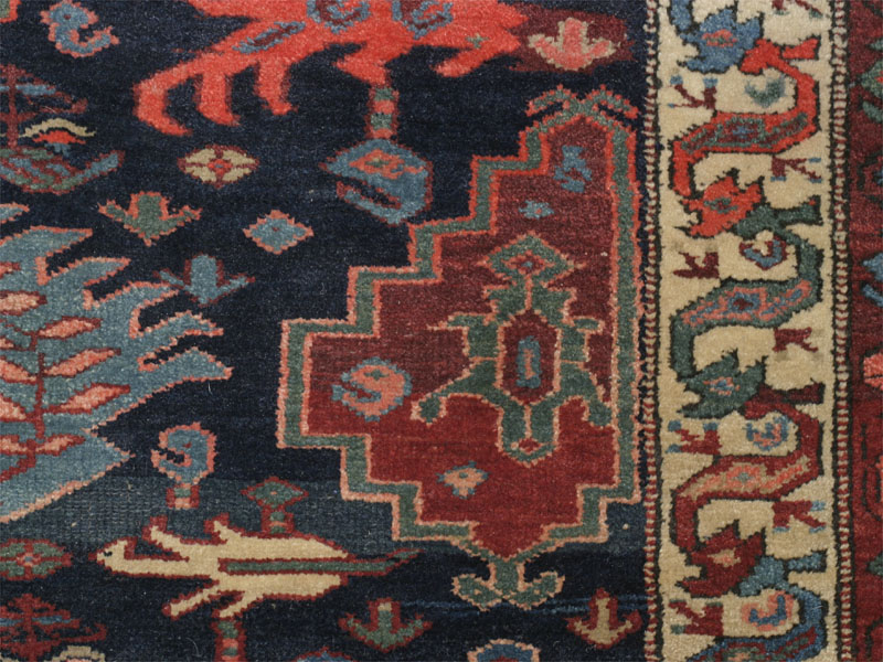 Antique north-west Persian Kurdish Palmette rug: detail in centre right of field
