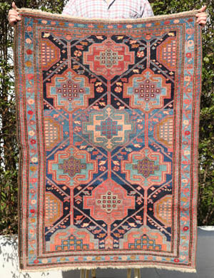 Bakhtiari Rozveh village rug with repeating medallions- click to see enlarged view