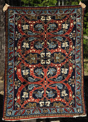 Sarouk poshti with arabesque pattern