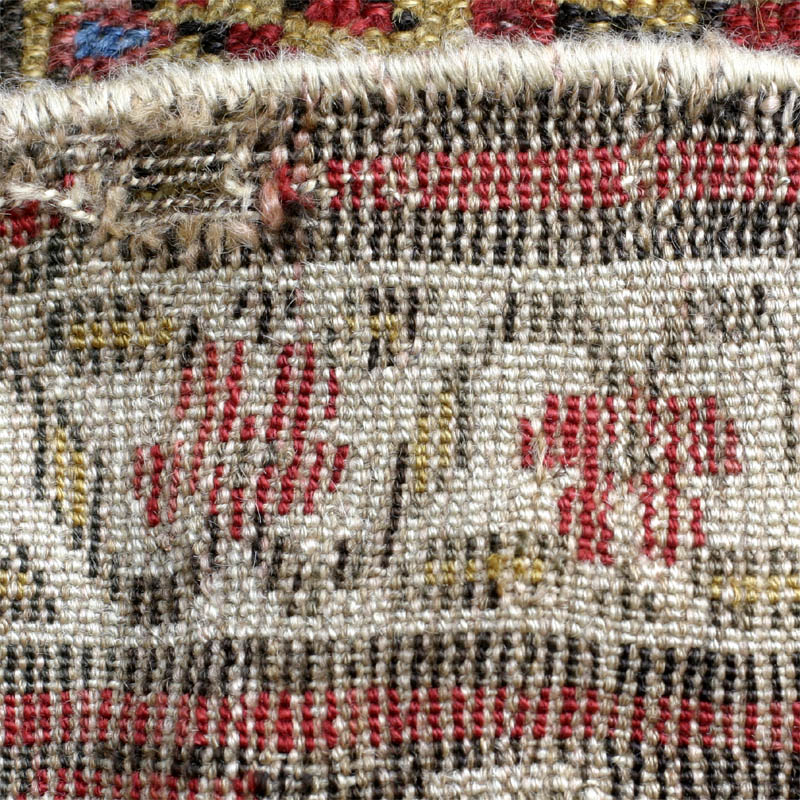 Antique Kurdish rug, end of 19th c., shrubs on yellow ground: back side view