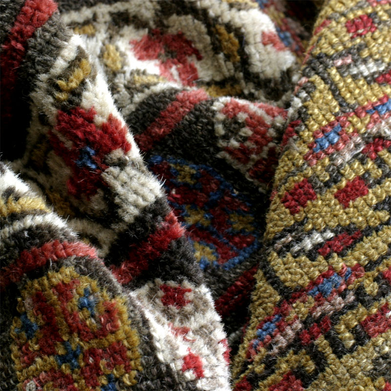 Antique Kurdish rug, end of 19th c., shrubs on yellow ground: pile fold