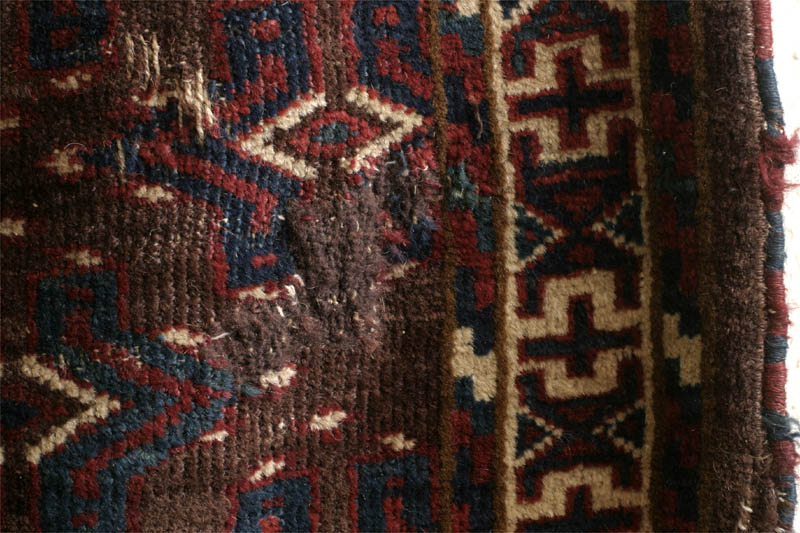 yomud turkmen rug, darning patch