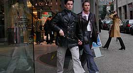 Couple leaving shop, rather blasé